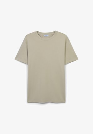 T-shirt court beige clair à manches courtes fabriqué en coton doux, avec un col rond et une coupe droite sans motifs distincts.