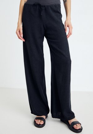 Spodnie materiałowe