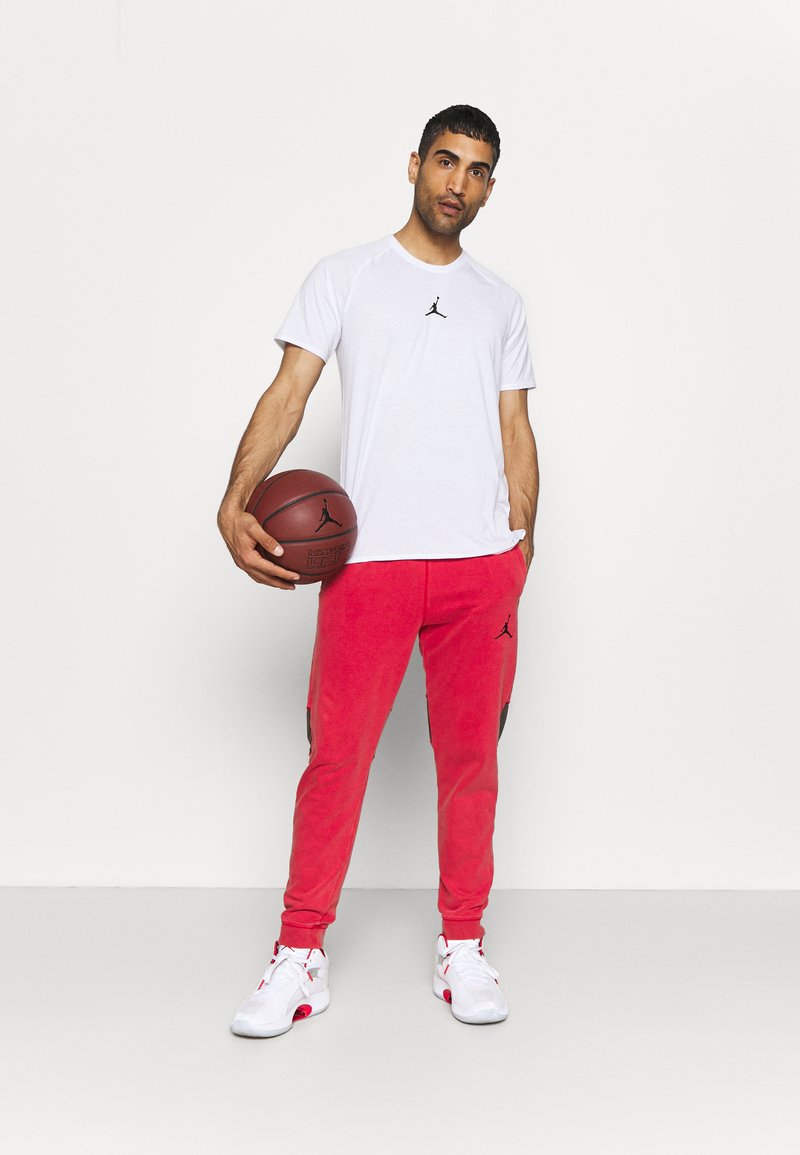 Herren Trainingsanzüge | Jordan AIR PANT Jogginghose gym red/black/rot - SU82508 Herren Trainingsanzüge | Jordan AIR PANT Jogginghose gym red/black/rot - SU82508