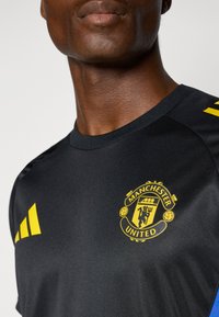 adidas Performance MANCHESTER UNITED - Sportfelső - black/blue/tribe yellow