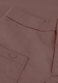 Burgundy leather fabric with a smooth texture, featuring a heart-shaped embossed detail on the pocket and contrasting stitching.
