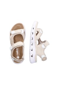 Beige sandals with white adjustable straps, cushioned insole, and textured outsole. Lightweight design with circular cutouts for breathability.