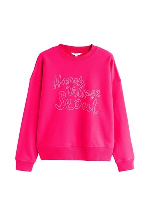 Helles pinkes Sweatshirt mit gerippten Bündchen und Saum, vorne mit weiß besticktem Schriftzug "Hanok Village Seoul".