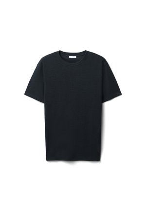 T-shirt nera a maniche corte con scollo rotondo, realizzata in tessuto strutturato, caratterizzata da una vestibilità morbida e orlo dritto.