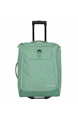 Mintgroene zachte koffer met wielen, een uitschuifbare handgreep en een ritsvak aan de voorkant, gemerkt met "travelite" rechtsonder.