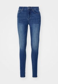 Jeans ajustados de denim, de color azul oscuro, con cinco bolsillos, cierre frontal de botón y cremallera, y con un ligero desgastado a lo largo de las piernas.
