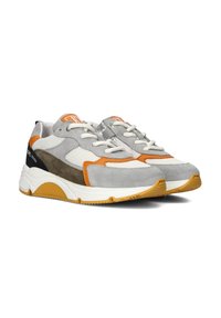 Gray and white sneakers with orange accents, suede and mesh material, rounded toe, textured sole, and contrasting black detail on the heel.