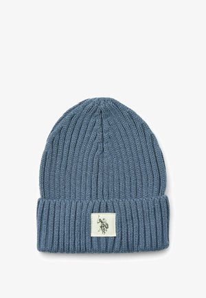Keskmise sinise värvi kootud beanie, ribatektsuuriga, millel on volditud äär ja väike valge etiket, millel on graafika.