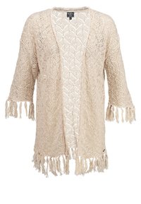 Beige gehaakte cardigan met open voorkant, driekwart mouwen en franjes aan de onderkant en mouwen. Lichtgewicht en met een gestructureerd ontwerp.