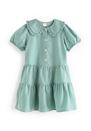 Robe en vichy vert et blanc avec manches courtes bouffantes, col Peter Pan à volants, boutons sur le devant et jupe à étages.