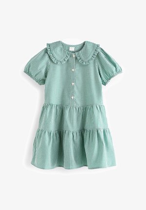 Robe en vichy vert et blanc avec manches courtes bouffantes, col Peter Pan à volants, boutons sur le devant et jupe à étages.