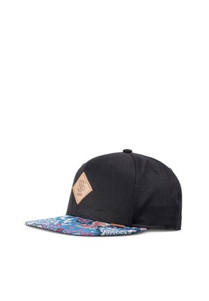 Black snapback cap with a multicolored blue patterned flat brim and a tan diamond logo patch on the front panel.