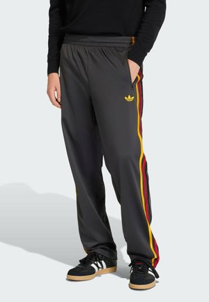 FIREBIRD  - Jogginghose - utility black collegiate/gold team/power red