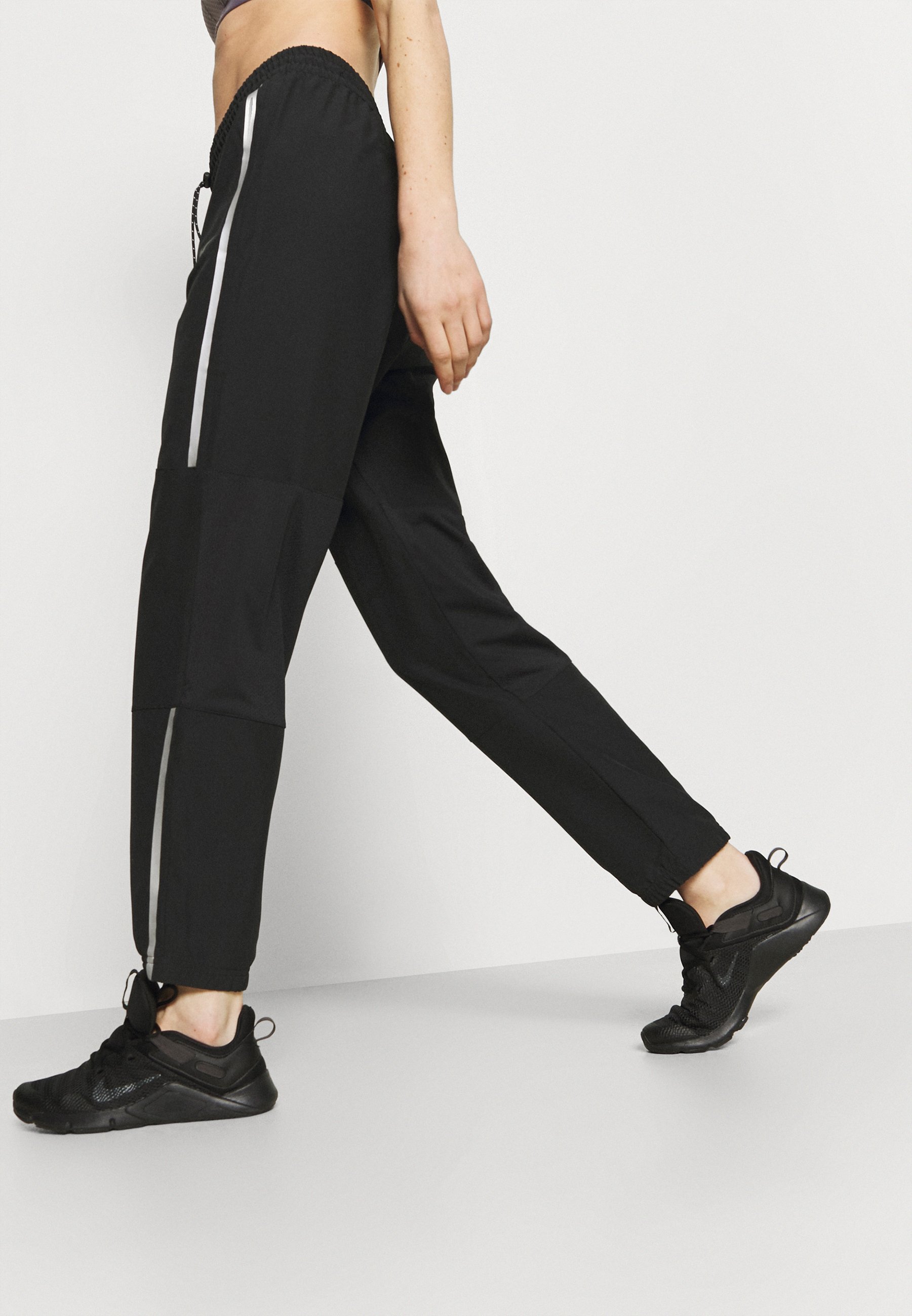 nike metallic pants