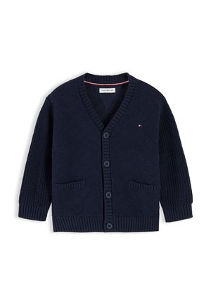 Marineblauer Strickcardigan mit V-Ausschnitt, Knopfverschluss, zwei Fronttaschen und kleinem Tommy Hilfiger-Logo auf der Brust.