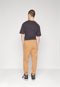 Jordan Joggebukse - legend dark brown/white
