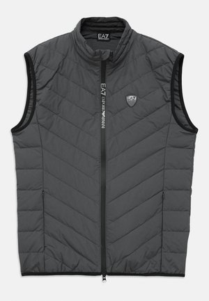 Sivo brezrokavnik s podlogo, z dvignjenim ovratnikom, sprednjim zadrge, dvema žepoma z zadrgo in logotipom EA7 Emporio Armani na prsih ter pokrovčku zadrge.