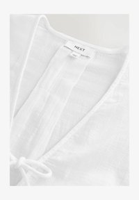 Sélectionné, white