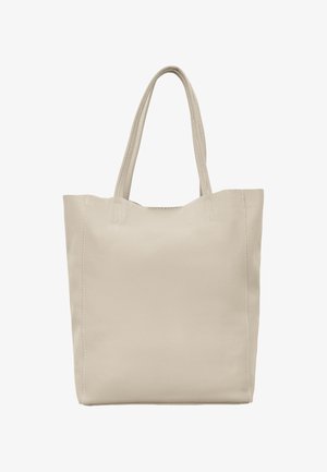 Beige læder tote taske med to lange hængsler, enkelt design og blød tekstur, vist på en ensfarvet hvid baggrund.