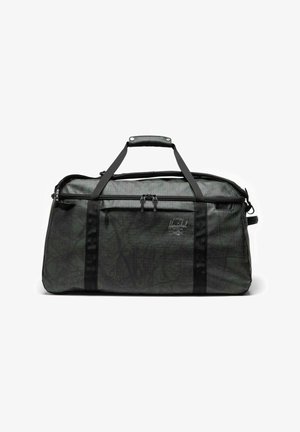 Sac de sport Herschel noir et vert foncé avec deux poignées supérieures, poche zippée sur le devant et motif de feuilles subtil sur le tissu.