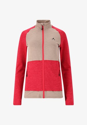 Kevyt takki, joka on valmistettu teksturoidusta kankaasta. Takissa on beige vartalo ja punaiset hihat, täydellinen vetskari ja vetskarilliset taskut. Musta logo korostaa takkia.