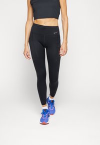 Nike Performance W NK DF GO MR 7/8 TGHT - Leggings - black