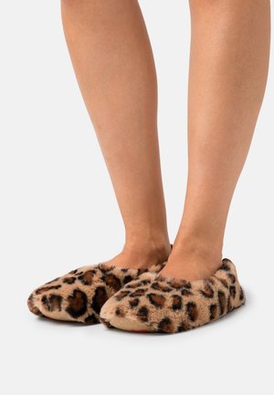 Leopard print slippers with soft, plush fur exterior, rounded toe design, and flat soles, showcasing a blend of tans and browns.