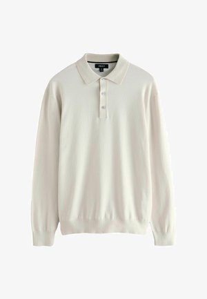 Lichtbeige poloshirt met lange mouwen van zacht materiaal, voorzien van een drieknoopsluiting en een klassieke kraag, met ribgebreide manchetten en onderkant.