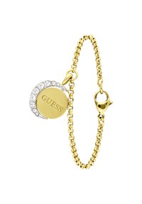 Gouden armband met een ronde bedel met het "GUESS" logo en heldere rhinestone accenten. Schakel ontwerp met een karabijnsluiting.