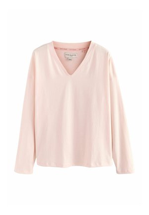 Hosszú ujjú, V nyakú ing puha rózsaszín pamutból. Lazán illeszkedő, minimális varrásokkal és sima textúrával, egyszerű dizájnnal.