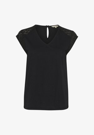 Melnas īsām piedurknēm topiņš ar V veida kakla izgriezumu, ar mežģīņu detaļām uz pleciem un mazu atslēgvārdu atveri aizmugurē. Gluda tekstūra.