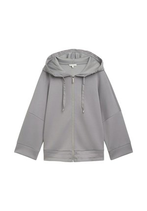 Veste à capuche zippée gris clair avec une coupe décontractée, présentant une texture lisse, des manches larges et un design simple sans motifs.