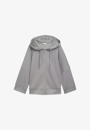 Heledad hallhallukka, kerge halli tooniga, vabalt istuv, sujuva tekstuuriga, laia varrukaga ning lihtsa disainiga, ilma mustriteta.