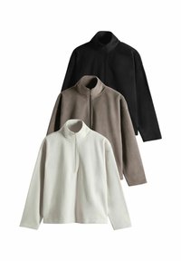 Fleece-Pullover in Schwarz, Taupe und Weiß, mit einem halben Reißverschlusskragen, langen Ärmeln und einer weichen, strukturierten Oberfläche.