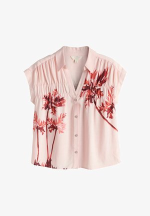 Light pink shirt made of linen with a button-down front. Features short sleeves and a floral pattern in shades of red and pink.