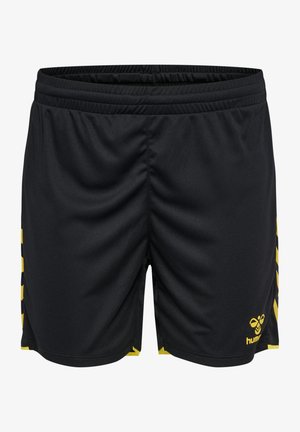 Svarta sportshorts med gula chevronränder på sidorna och en gul hummel-logotyp på det nedre högra benet.