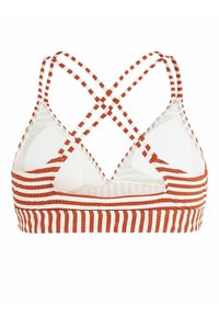Bikini top crvenih i bijelih pruga s trokutastim oblikom, koji ima ukrštene trake i teksturiranu tkaninu. Podesiv i obložen iznutra.