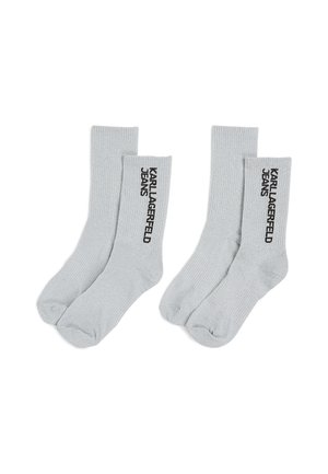 Light gray ribbed socks with black "KARL LAGERFELD JEANS" text. Elastic cuff at the top and soft, stretchy fabric for comfort.