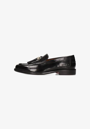 Schwarze Lederloafers mit polierter Oberfläche, mit dekorativem Quasten-Detail und niedrigem Absatz. Klassisches Design mit genähten Akzenten.