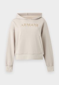 Sweat à capuche beige à manches longues, poche kangourou avant et logo « ARMANI EXCHANGE » en lettres couleur sable sur la poitrine.