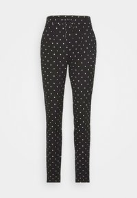 Svarta byxor med vita prickar, med dragsko i midjan, smal passform och slät textur. Enkelt design utan ytterligare dekorationer.