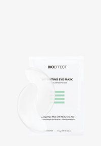 Hydrogel-Augenmaske in semi-transparenter, geschwungener Form. Die Verpackung ist weiß mit schwarzem und grünem Text, der auf die enthaltene Hyaluronsäure hinweist.