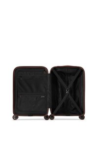 Hard-shell suitcase with a black interior, featuring multiple compartments, elastic straps, and a brown zipper accent. Four swivel wheels.