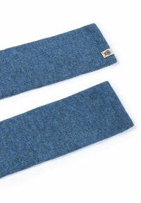 Blue knitted fabric with slight texture, featuring a natural fiber blend. Ends are finished with a small branded tag.