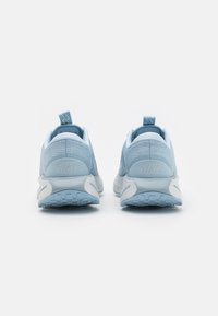 Nike Performance MOTIVA - Road running shoes - light armory blue/photon dust