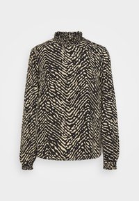 Blouse noire à manches longues avec un motif de rayures irrégulières beiges, col haut froncé et poignets élastiques.