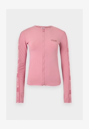 Pink long-sleeve zip-up top with "Moschino" branding on chest and printed multiple times along both sleeves.