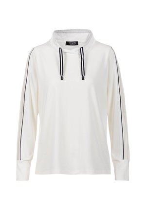 Witte top met lange mouwen en hoge kraag, zwarte trekkoorden en zwarte strepen langs de mouwen met mesh panelen.