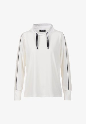 Witte top met lange mouwen en hoge kraag, zwarte trekkoorden en zwarte strepen langs de mouwen met mesh panelen.