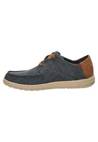 Scarpe casual con tomaia in tessuto blu scuro, dettagli in suede marrone e suola in gomma beige. Presentano una chiusura con lacci e un motivo testurizzato.